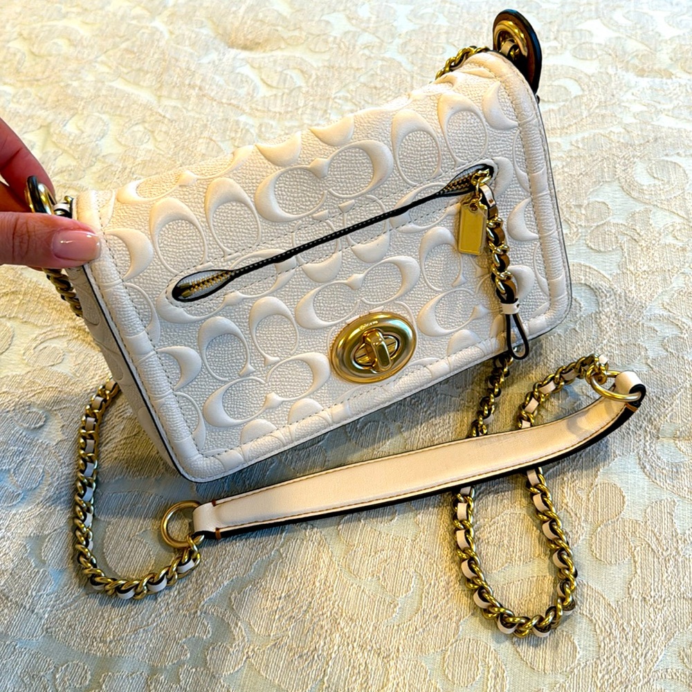 Winter white coach bag with gold